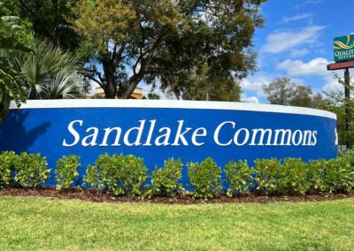 Westgate-Sandlake-Commons-Outdoor-curved-wall-entrance-routed-letters-sign1-Master-Pro-Renovations